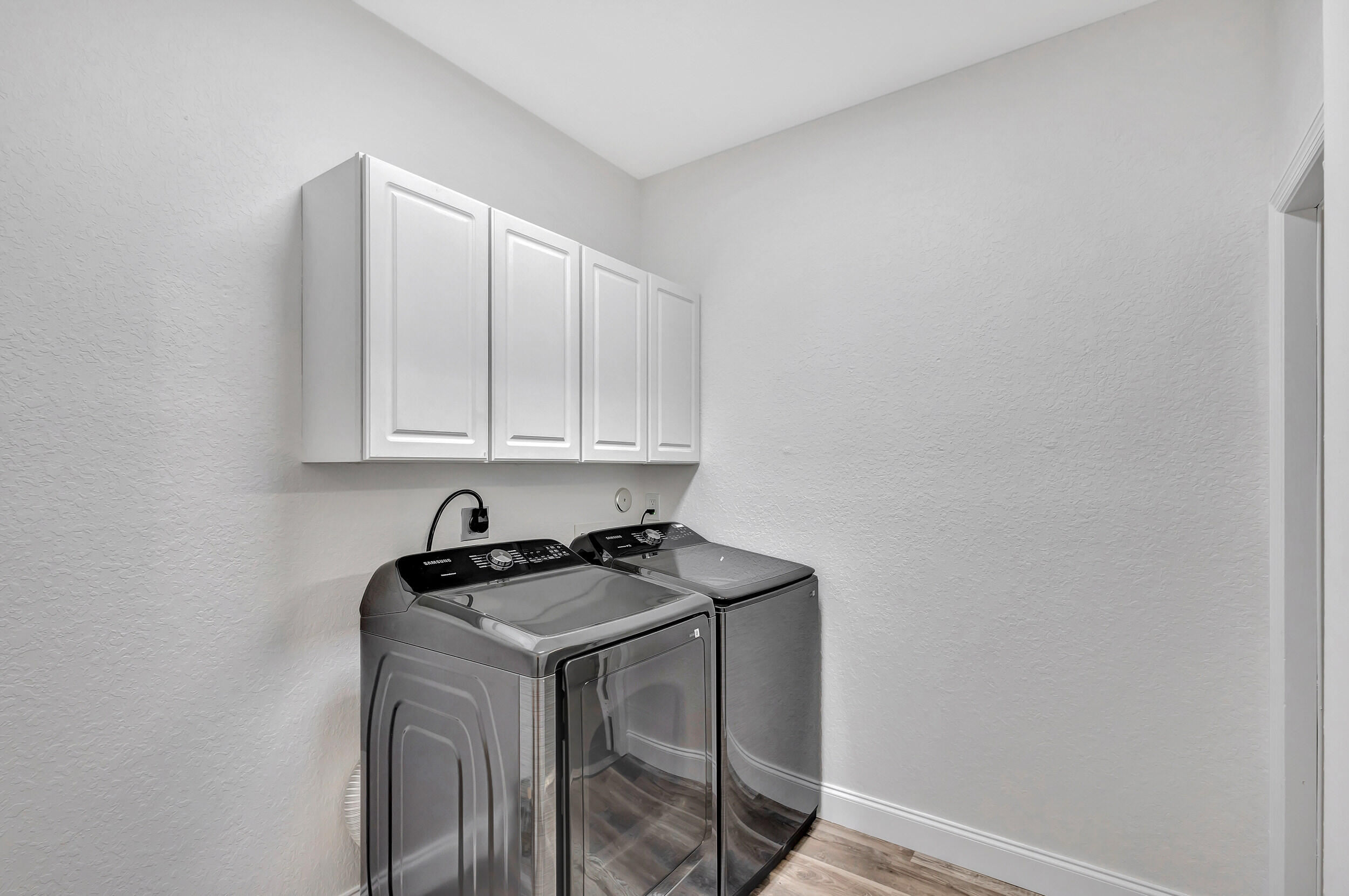 6746 3rd Street Limestone Creek, FL 33458 - Photo 18 of 60 a room with a sink and cabinets