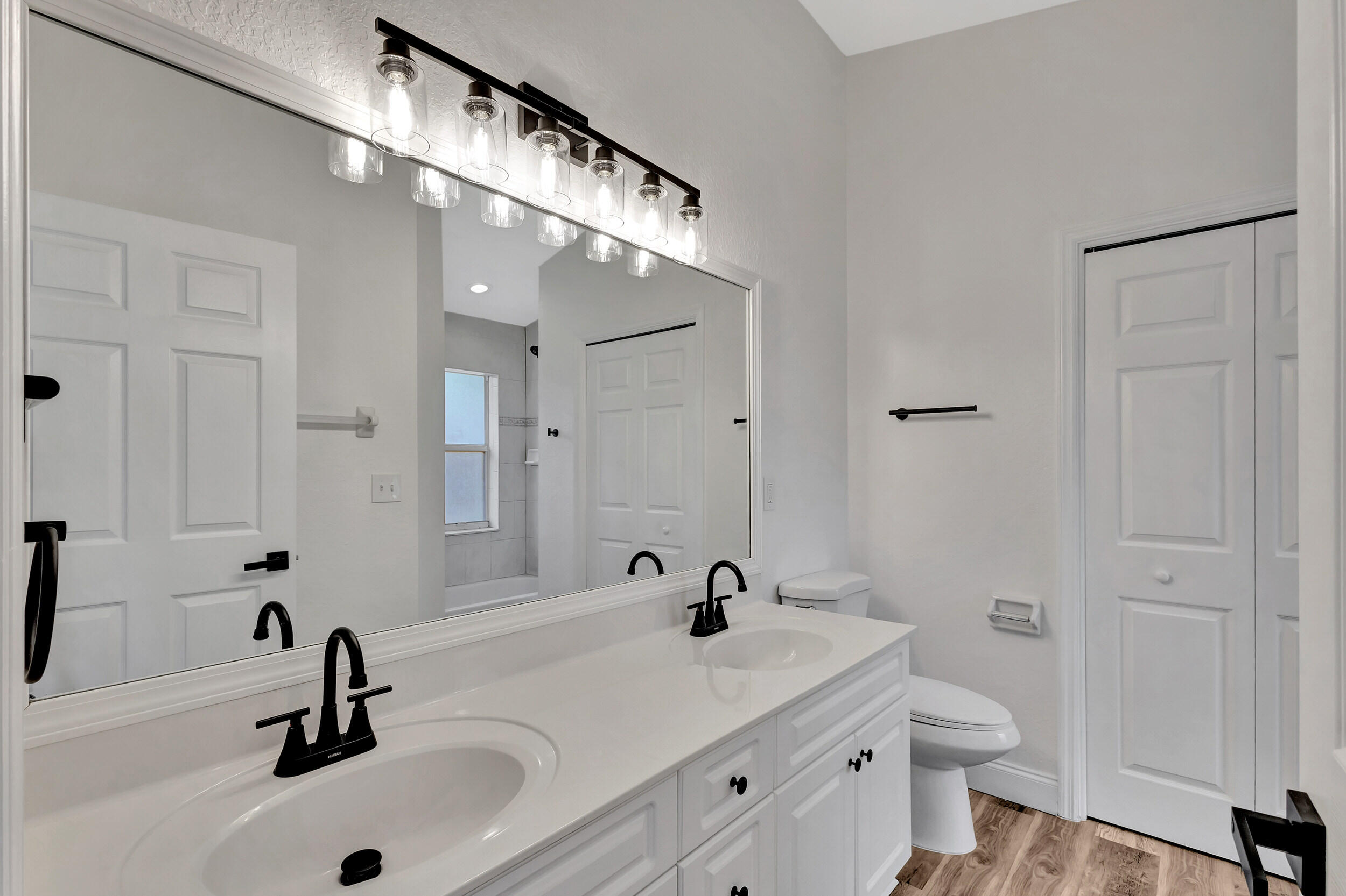 6746 3rd Street Limestone Creek, FL 33458 - Photo 28 of 60 a bathroom with a sink and a mirror