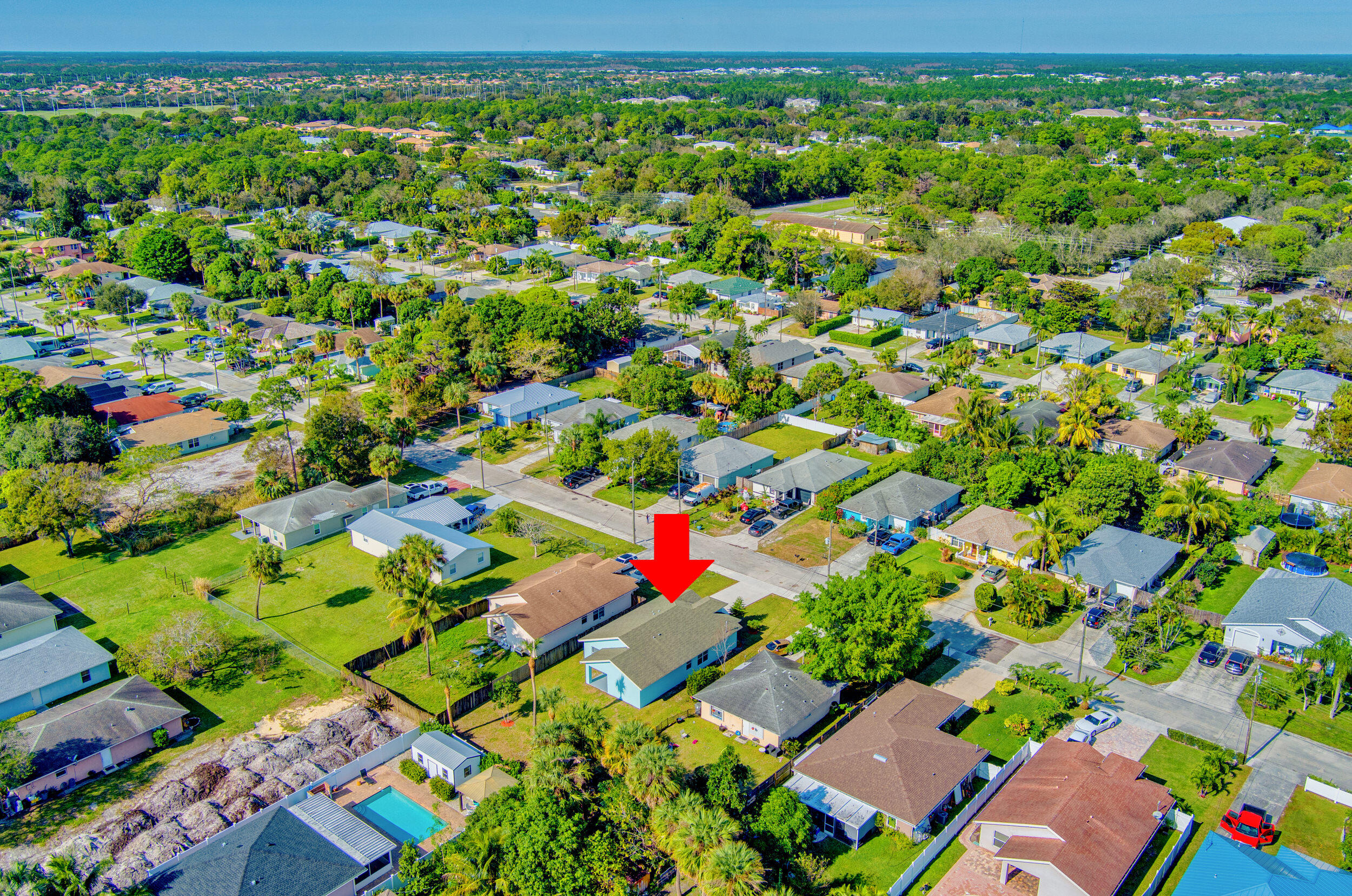 6746 3rd Street Limestone Creek, FL 33458 - Photo 57 of 60 an aerial view of residential houses with outdoor space