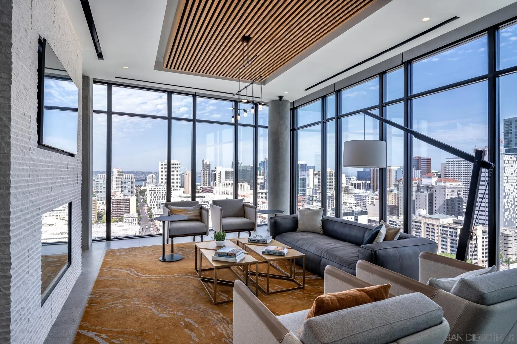 675 Ninth Avenue, Unit 2016 San Diego, CA 92101 - Photo 6 of 12 a living room with furniture and a large window