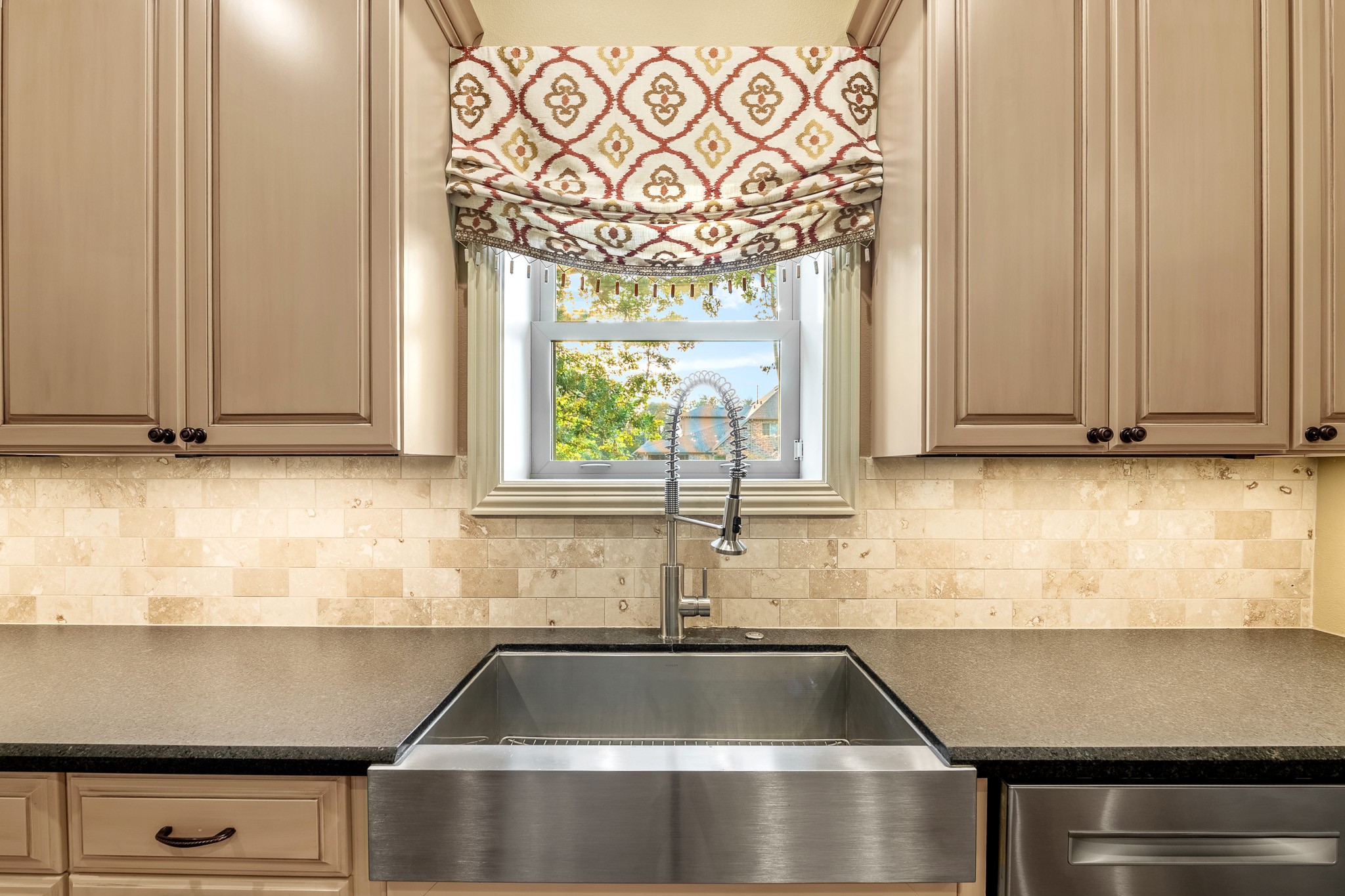 28002 Whispering Maple Way Spring, TX 77386 - Photo 20 of 44 a kitchen with a sink and a window
