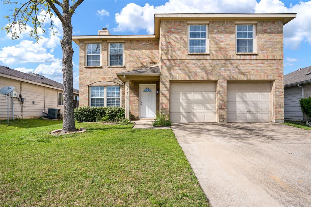1626 White Oak Road Anna, TX 75409 - Photo 3 of 30 a front view of a house with a yard and garage