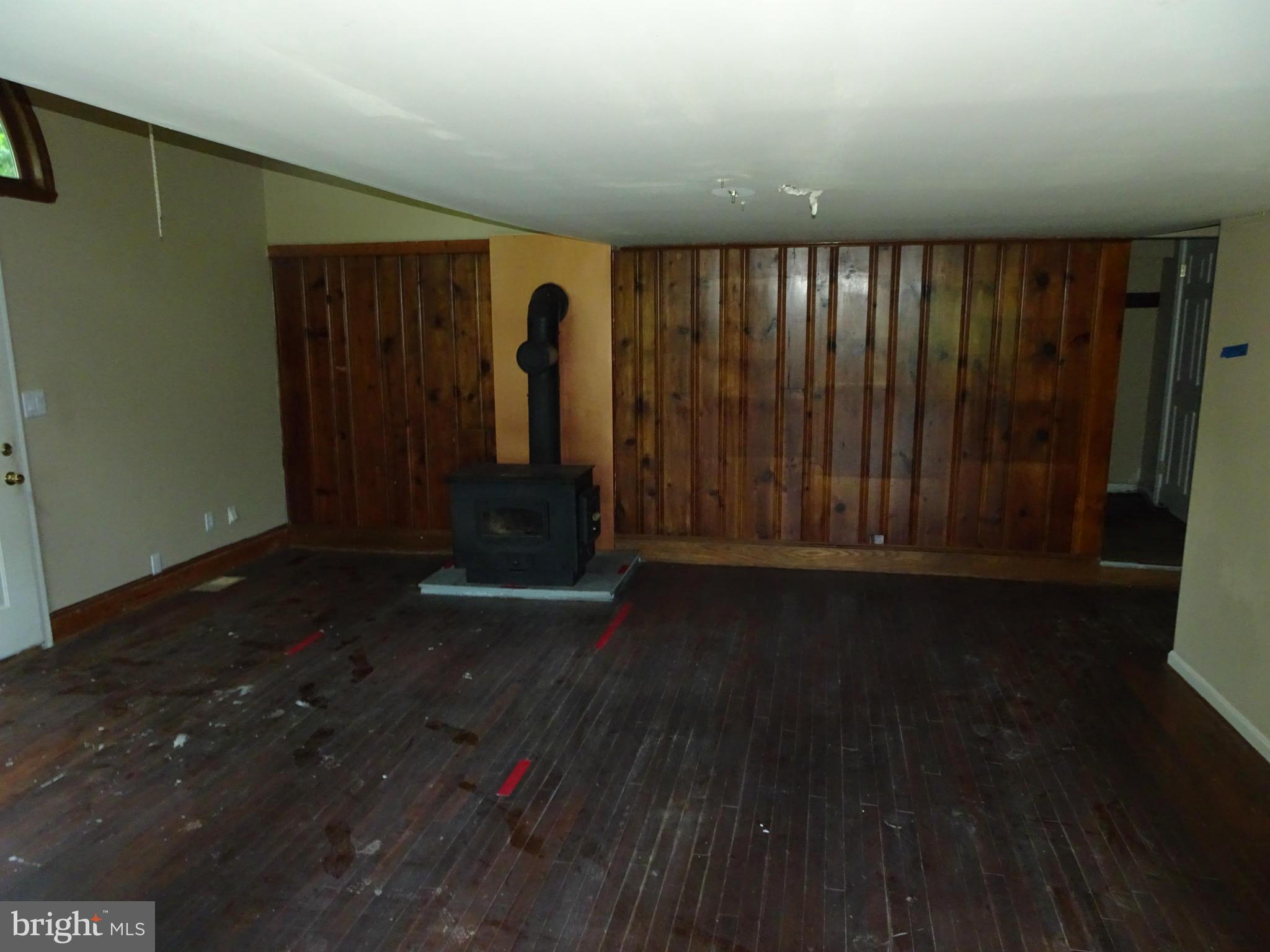 4514 Baptist Road Taneytown, MD 21787 - Photo 7 of 11 a view of a room with wooden floor and a window