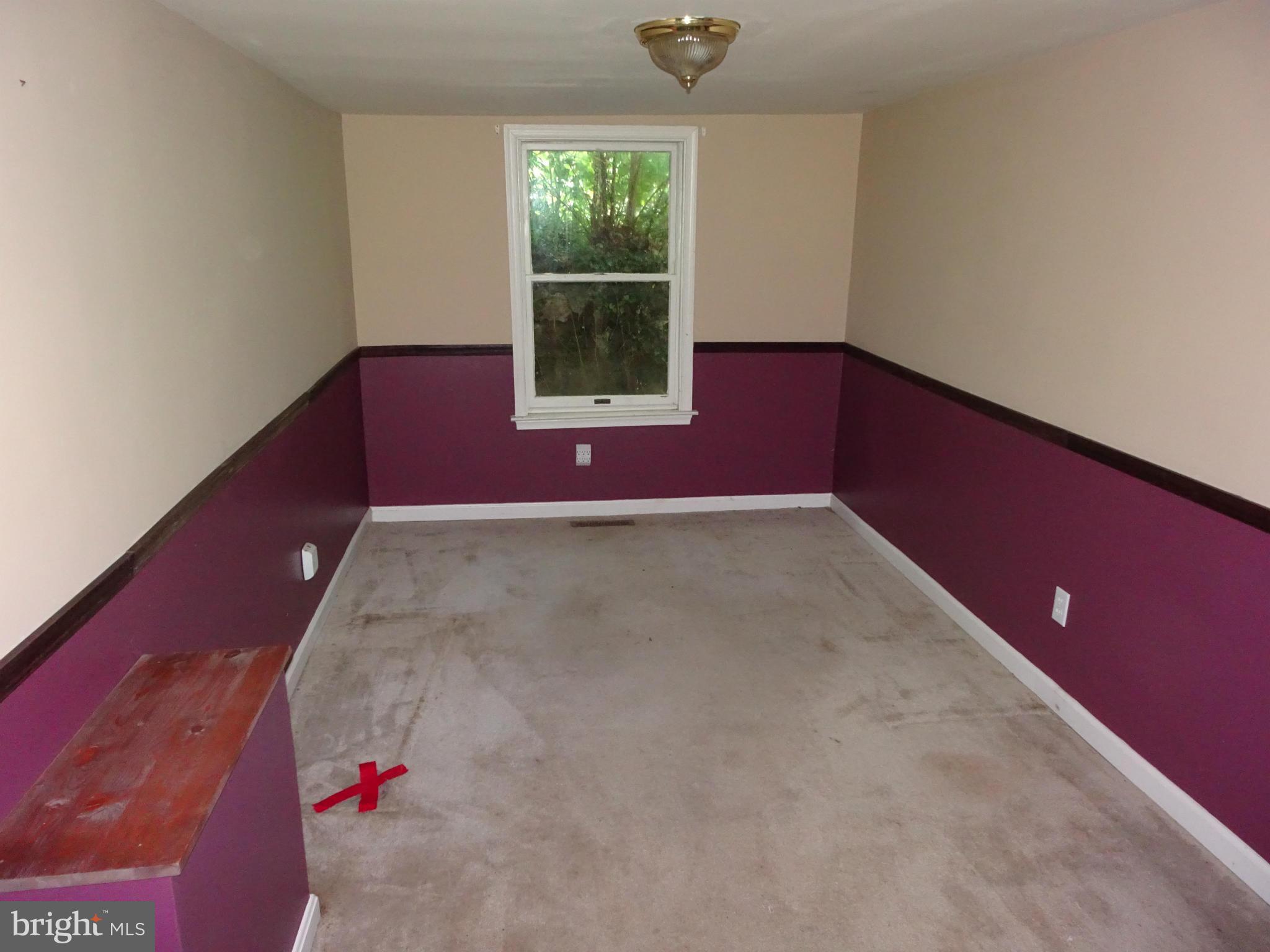 4514 Baptist Road Taneytown, MD 21787 - Photo 9 of 11 a view of an empty room with a window