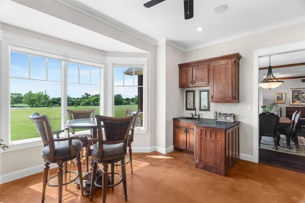 a kitchen with stainless steel appliances granite countertop a stove and a sink