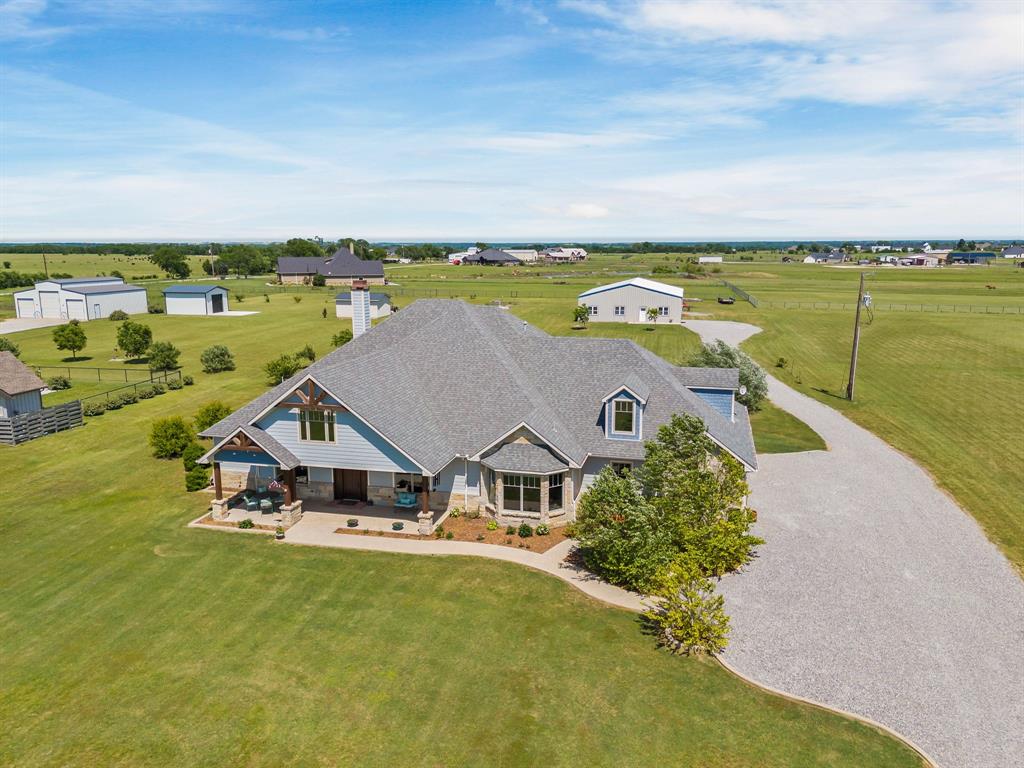1206 Jc Maples Road Gunter, TX 75058 - Photo 2 of 40 an aerial view of a house with a ocean view