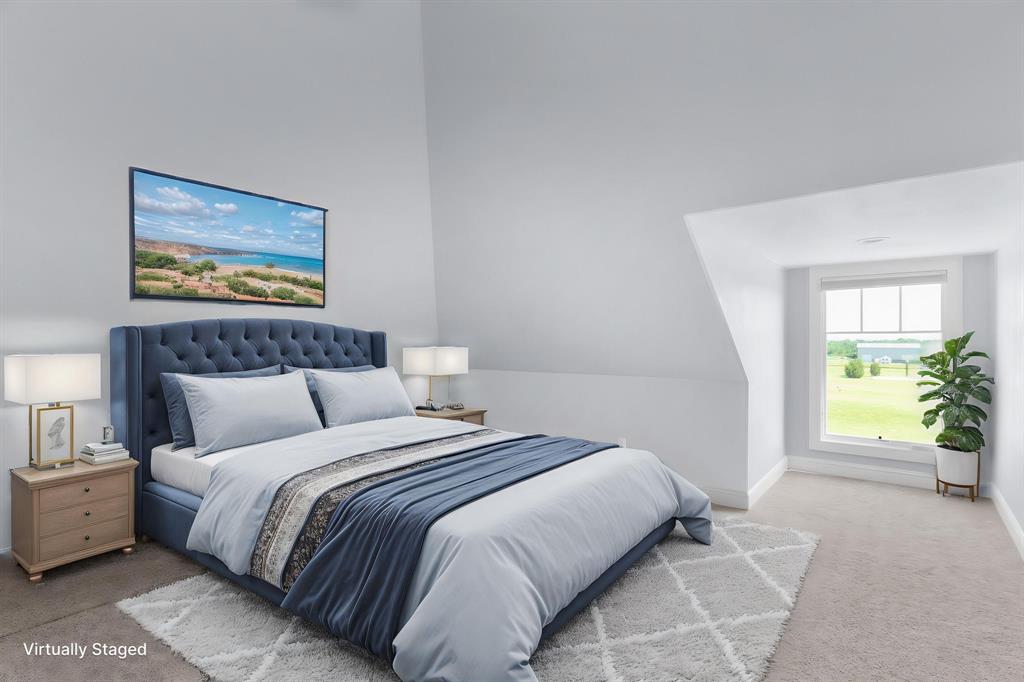 1206 Jc Maples Road Gunter, TX 75058 - Photo 22 of 40 a bedroom with a bed and a painting on the wall