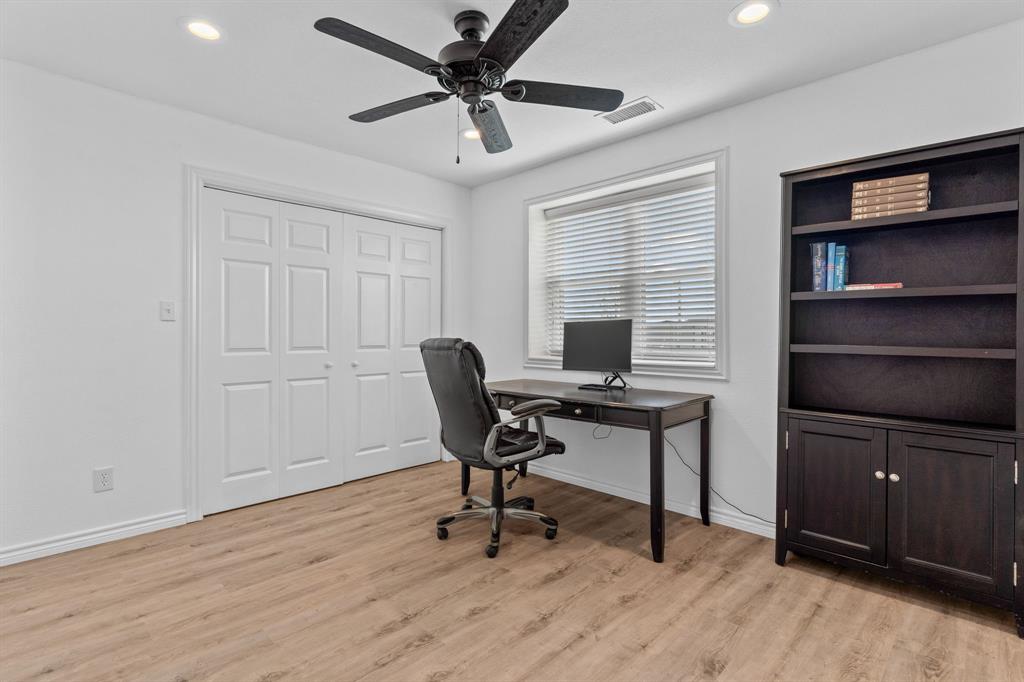 1206 Jc Maples Road Gunter, TX 75058 - Photo 32 of 40 a view of a workspace with furniture and a window