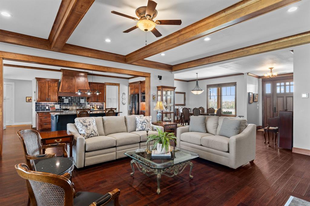 1206 Jc Maples Road Gunter, TX 75058 - Photo 39 of 40 a living room with furniture and wooden floor