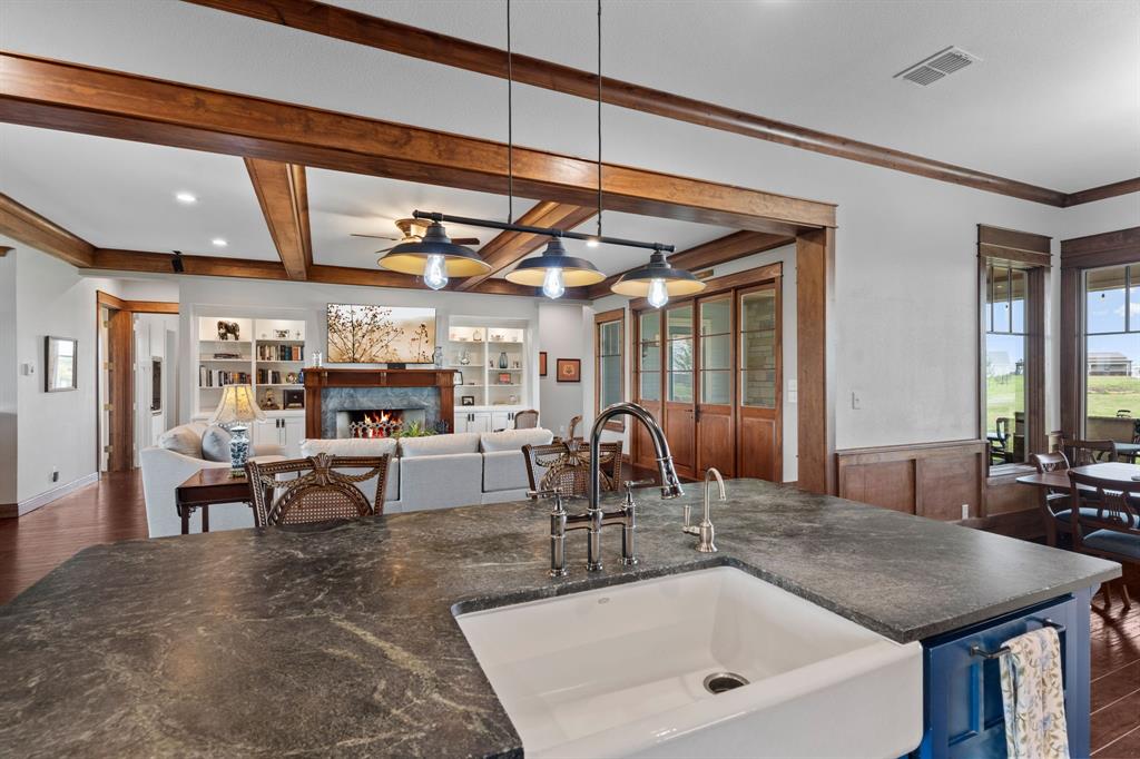1206 Jc Maples Road Gunter, TX 75058 - Photo 40 of 40 a kitchen with a table and chairs in it
