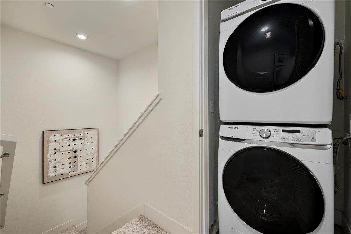 166 Nexus Loop San Jose, CA 95110 - Photo 13 of 29 a view of a hallway with washer and dryer