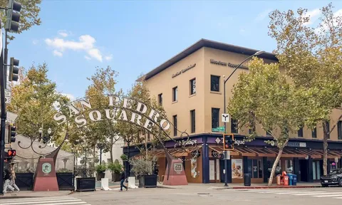 a view of a building with a street