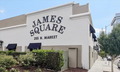 a sign on the side of a building