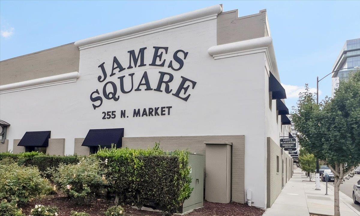 166 Nexus Loop San Jose, CA 95110 - Photo 28 of 29 a sign on the side of a building