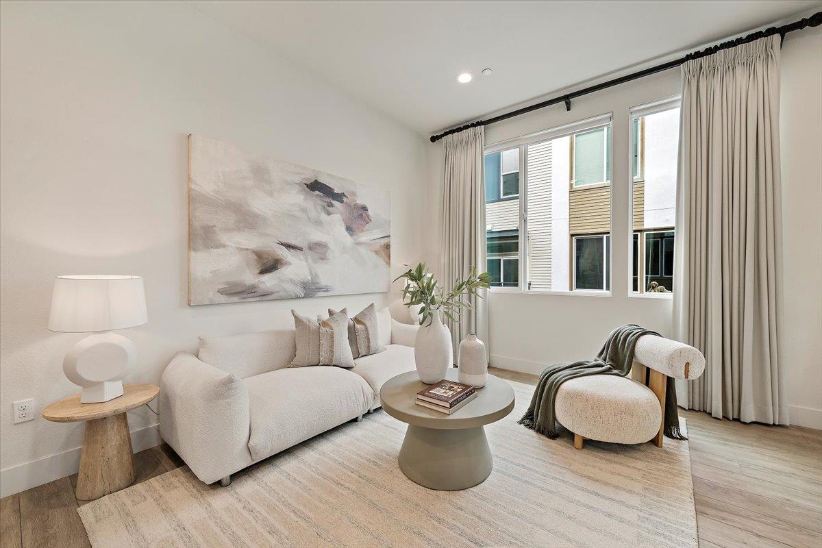 166 Nexus Loop San Jose, CA 95110 - Photo 6 of 29 a living room with furniture and a window
