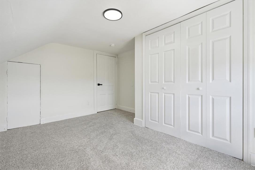 812 Linden Street Bethlehem, PA 18018 - Photo 26 of 39 A well-lit bedroom features plush carpeting and convenient closet space.