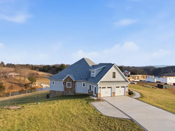 a view of a house with a big yard
