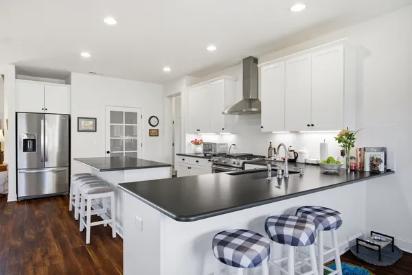 a en suite bathroom with a sink and a mirror
