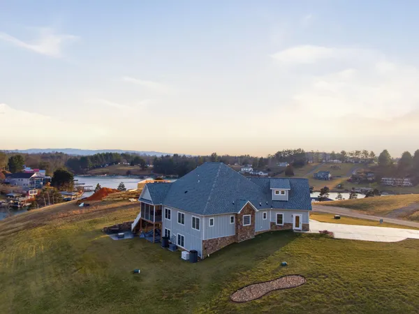 a terrace with outdoor seating and city view