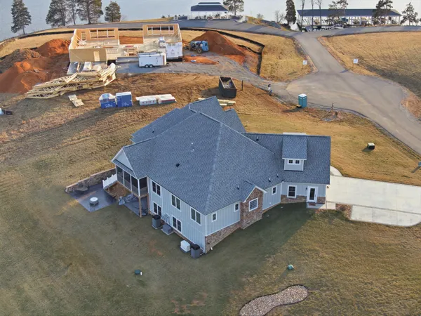 a open kitchen with stainless steel appliances granite countertop a stove and refrigerator