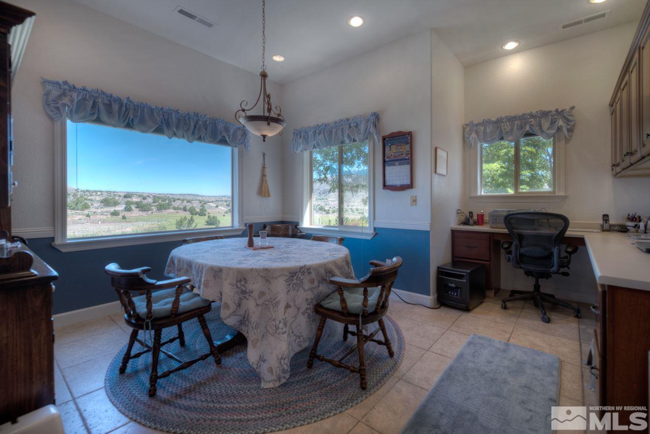 1215 Goldstone Road Reno, NV 89508 - Photo 8 of 23 a view of a dining room with furniture window and outside view