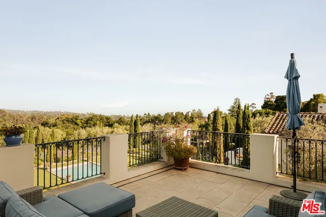 a view of a city from a lounge chairs