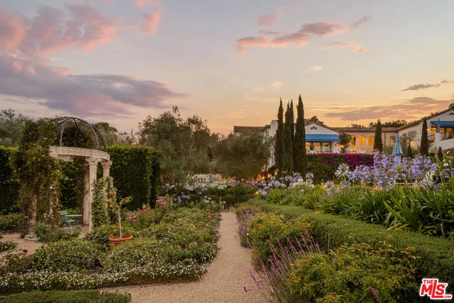 a view of multiple house with a street