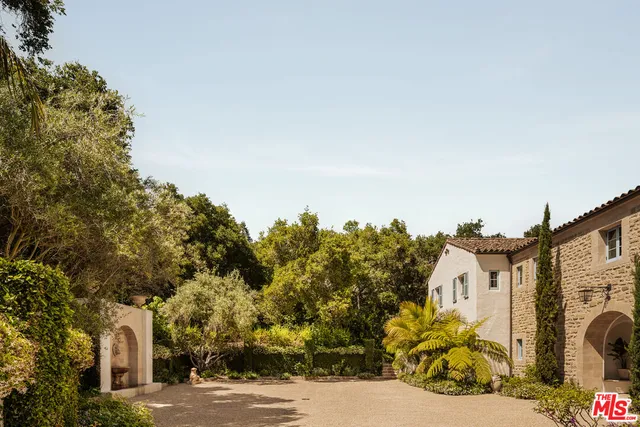 a view of a house with a street