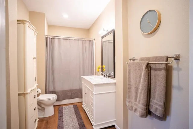 a view of front door with furniture and a window