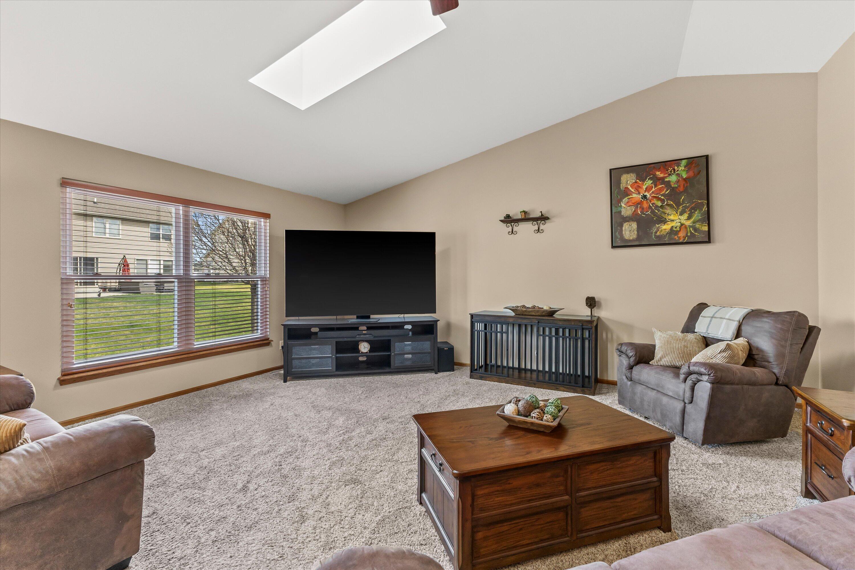 8316 Ivanhoe Place Sturtevant, WI 53177 - Photo 3 of 41 Great Room with Skylight