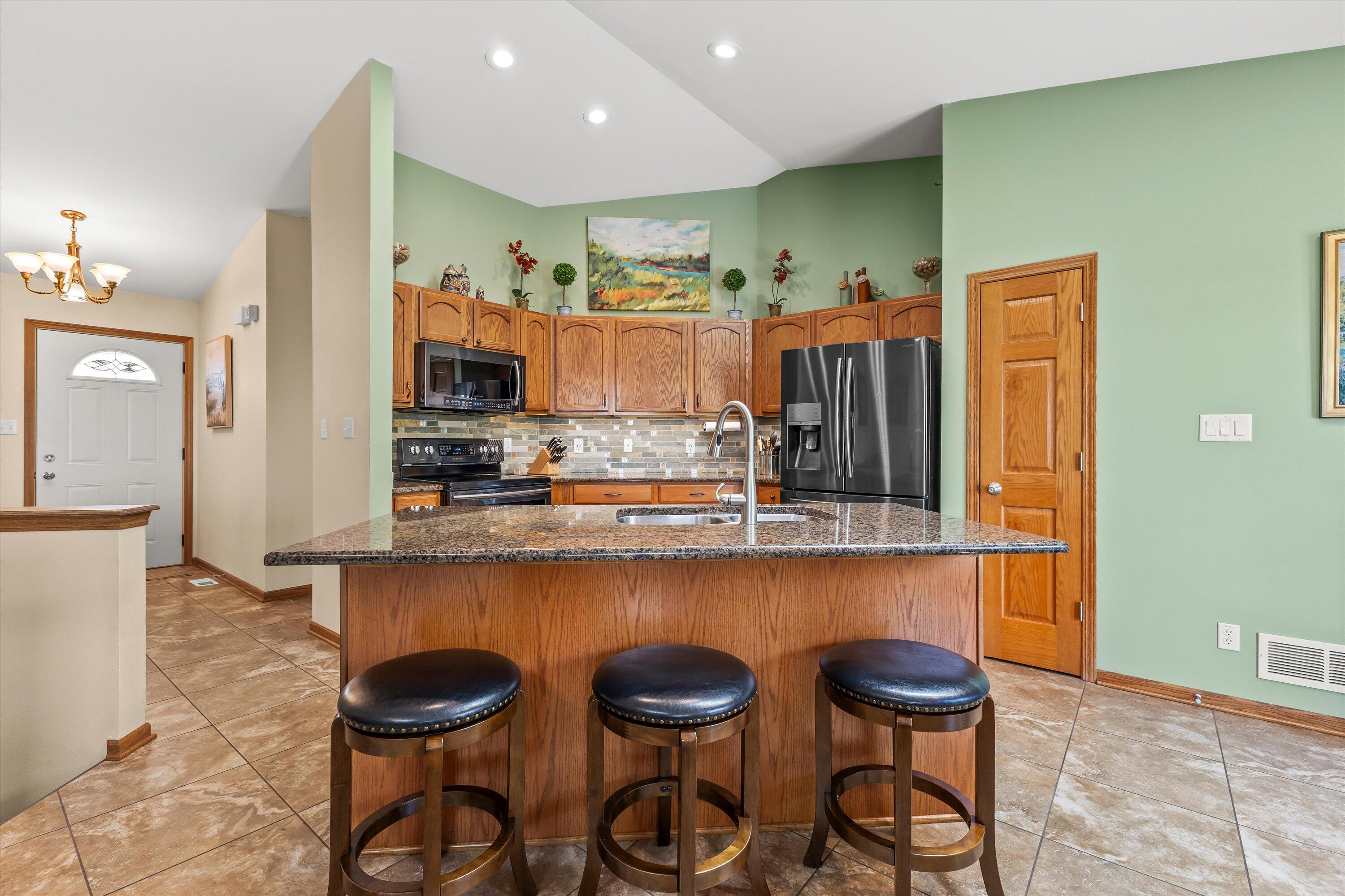 8316 Ivanhoe Place Sturtevant, WI 53177 - Photo 7 of 41 Updated Kitchen/ Breakfast Bar