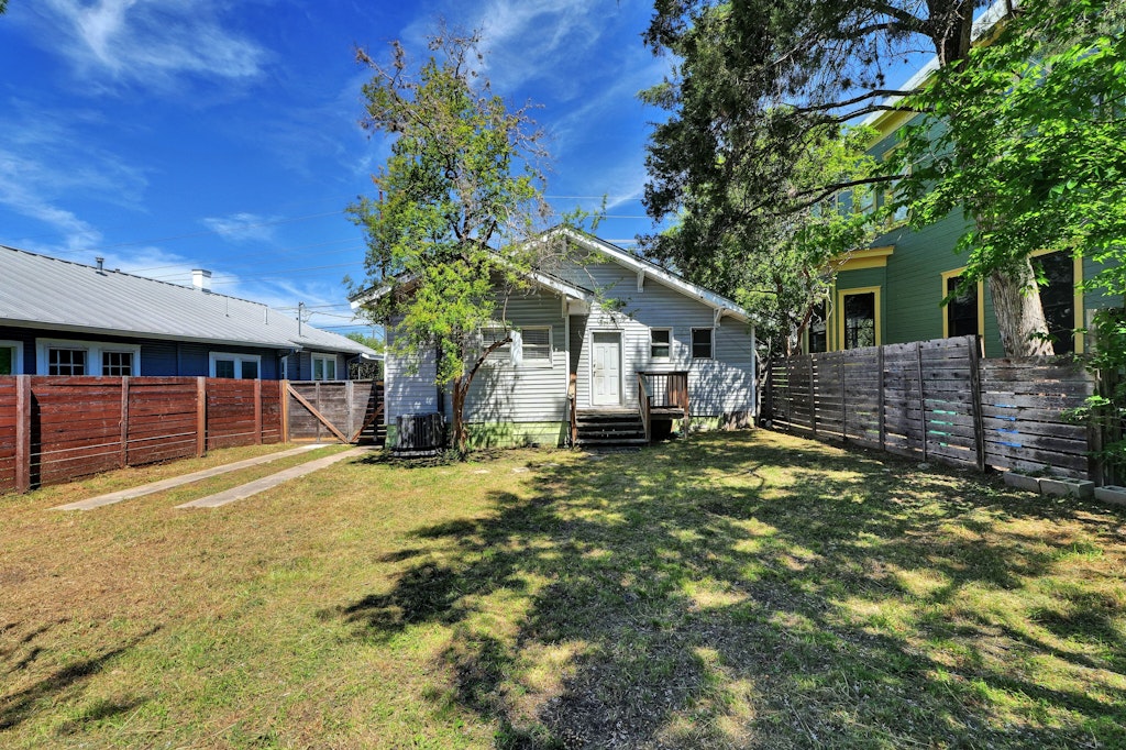 1205 East 12th Street Austin, TX 78702 - Photo 14 of 15 a view of a house with a yard