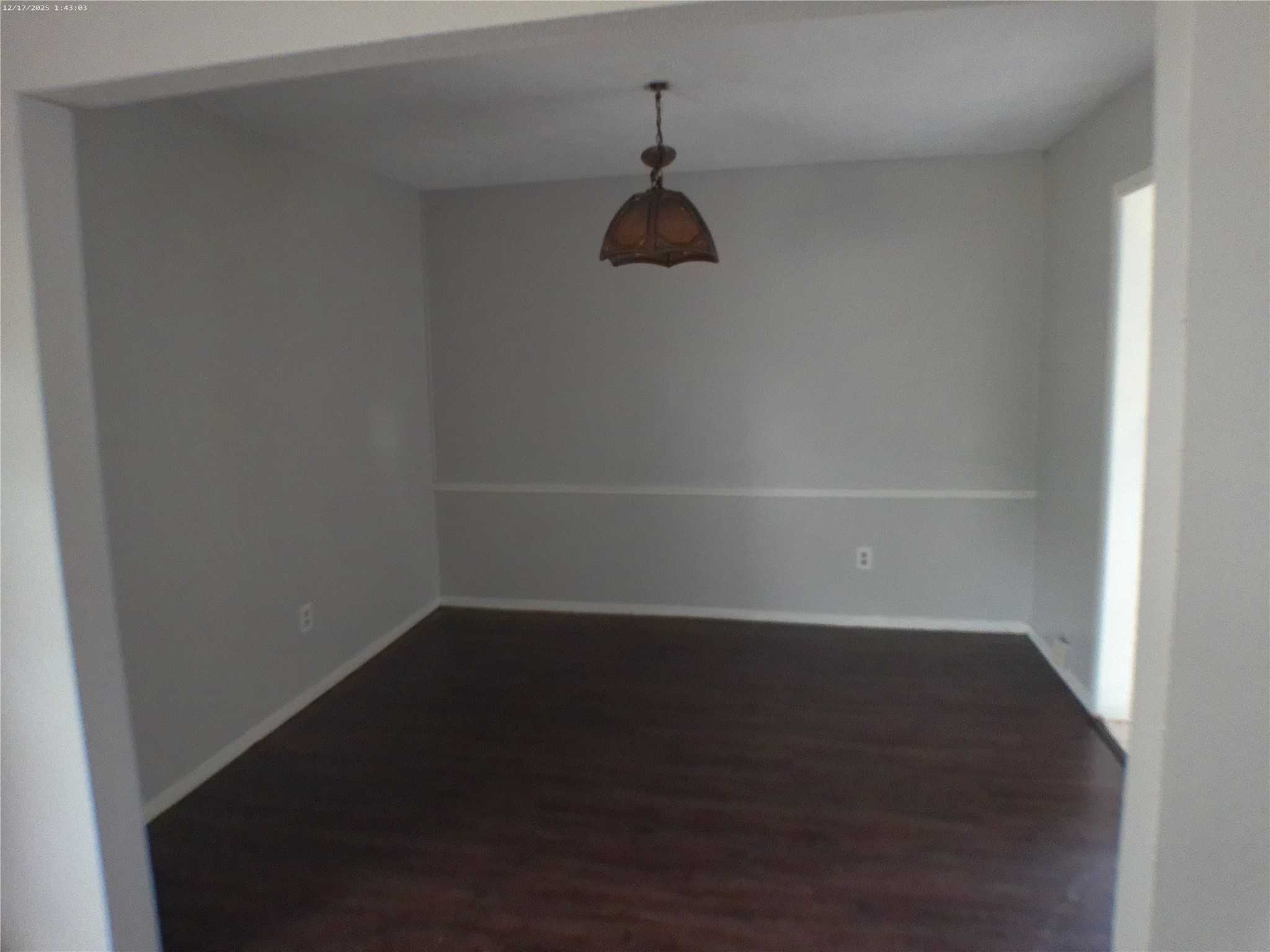 7322 West Fuqua Street Houston, TX 77489 - Photo 14 of 18 a view of a small space with wooden floor and a window