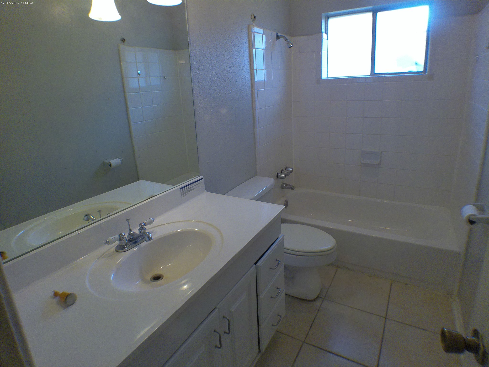 7322 West Fuqua Street Houston, TX 77489 - Photo 16 of 18 a bathroom with a sink a toilet and shower