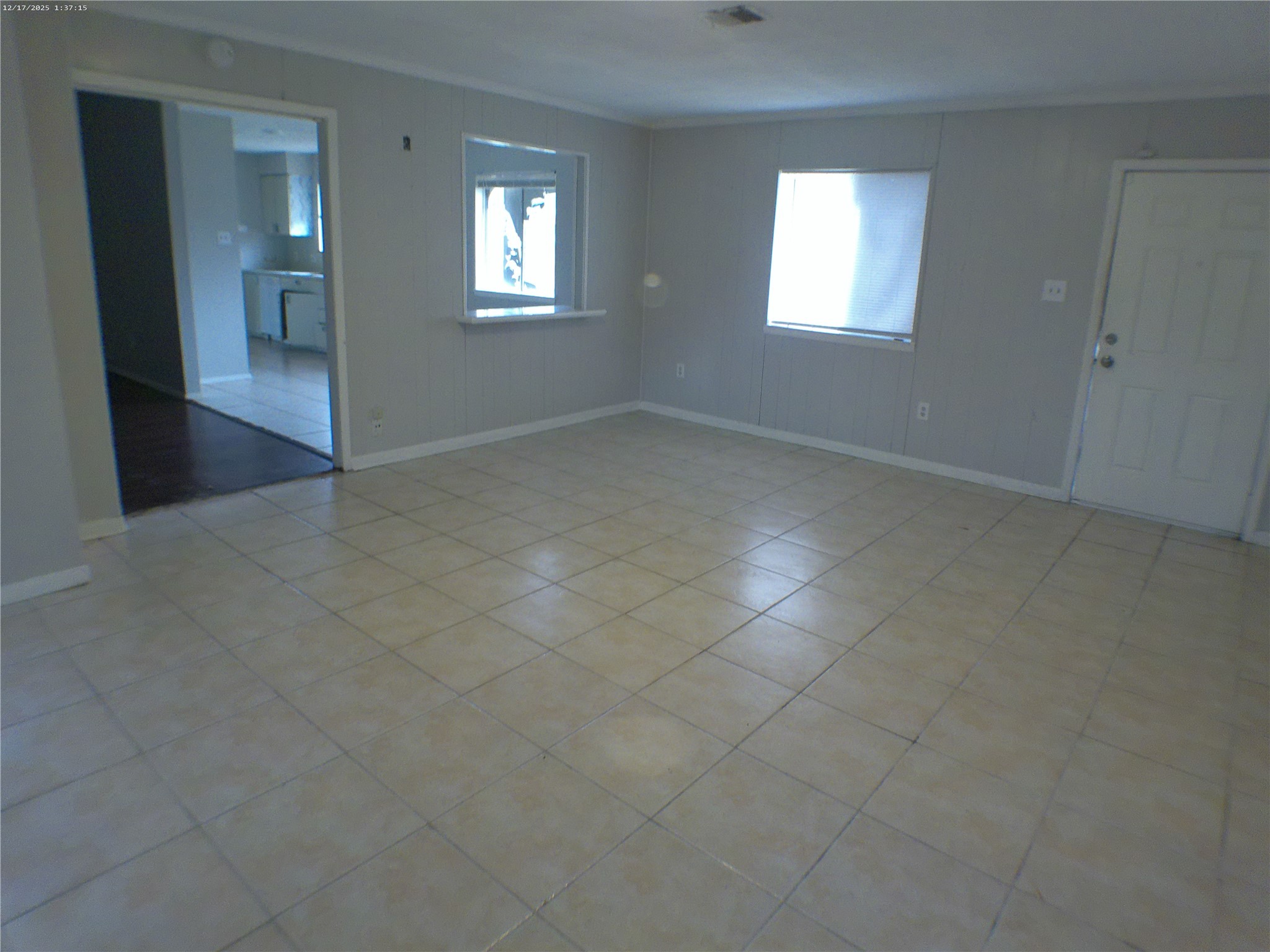 7322 West Fuqua Street Houston, TX 77489 - Photo 4 of 18 an empty room with windows and entrance