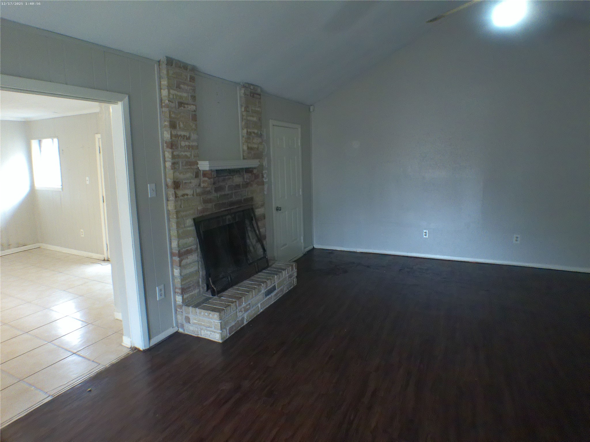 7322 West Fuqua Street Houston, TX 77489 - Photo 9 of 18 a living room with a fireplace
