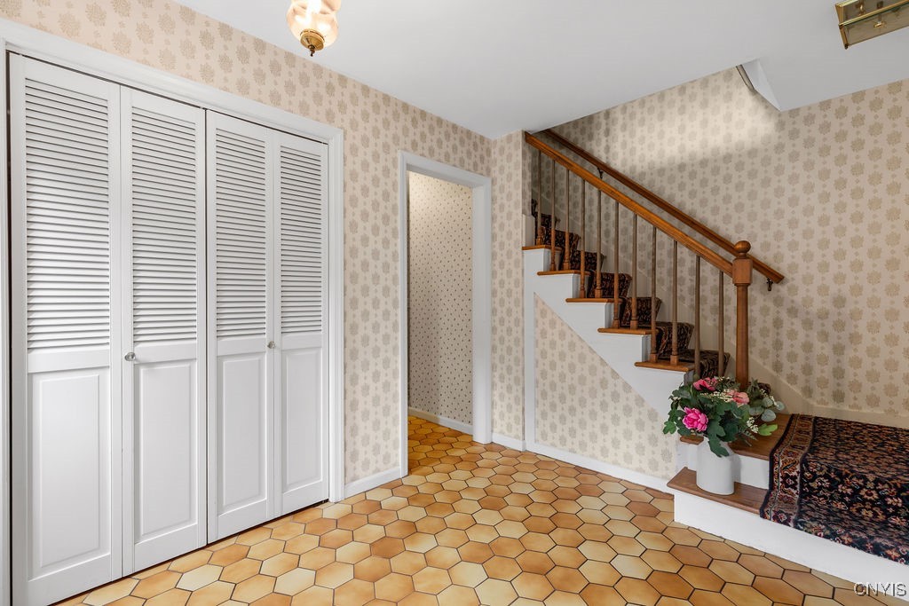 316 Broadview Drive Syracuse, NY 13215 - Photo 25 of 50 Beautiful hardwood staircase and closet for hiding