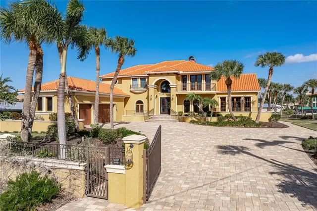 a living room with furniture and a ceiling fan