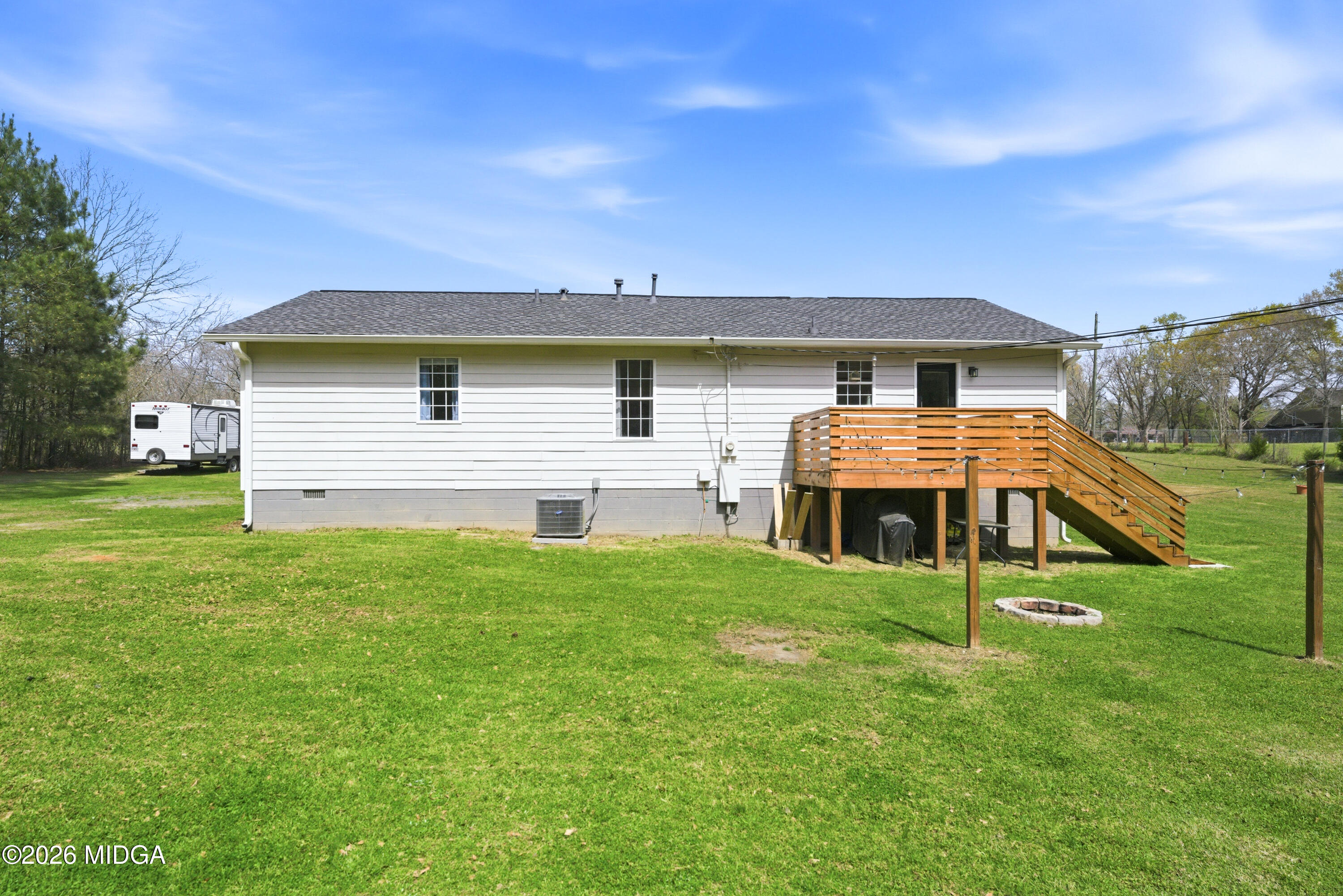 123 Mathews Road Milner, GA 30257 - Photo 34 of 51 a front view of a house with a yard