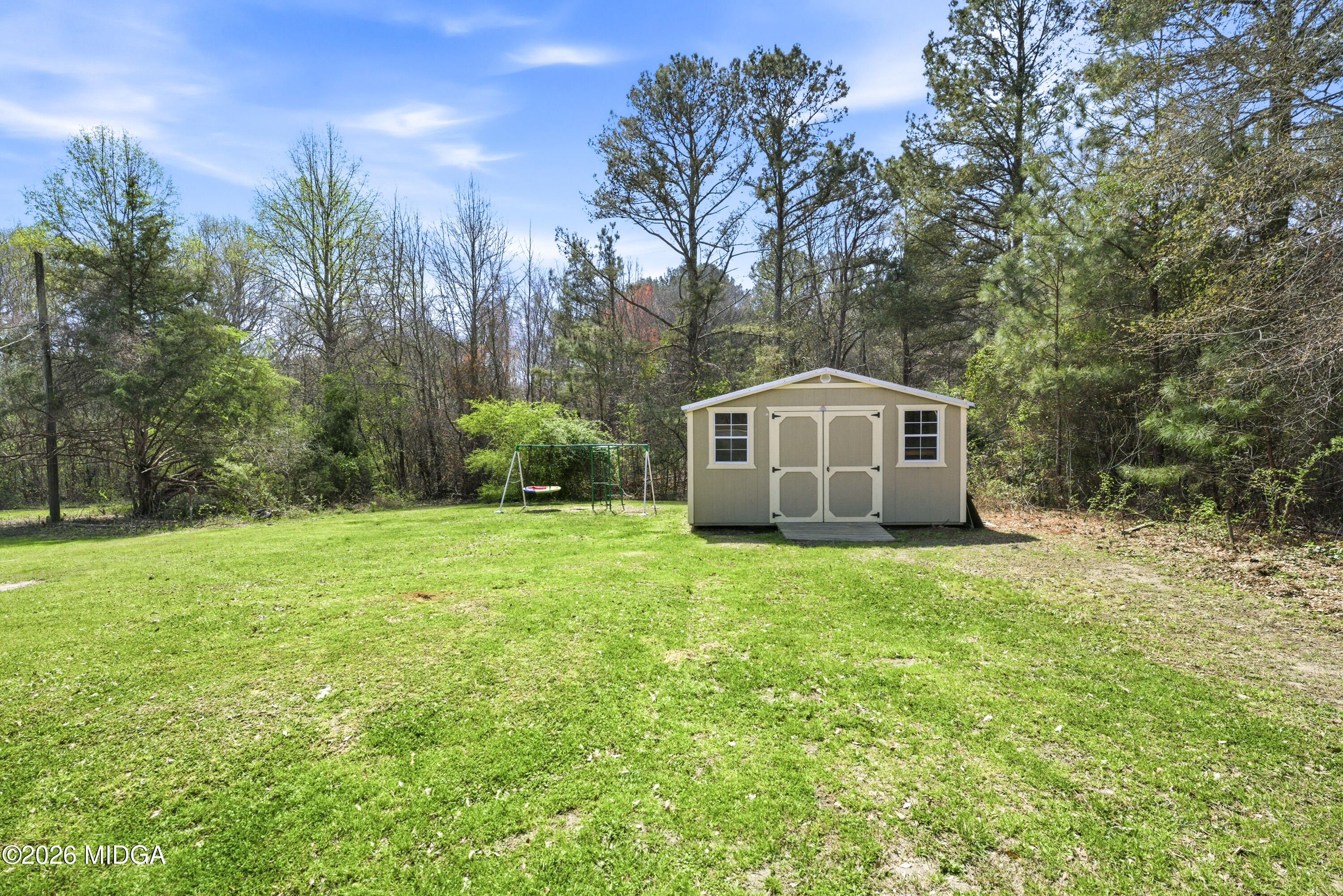 123 Mathews Road Milner, GA 30257 - Photo 39 of 51 a house view with a outdoor space