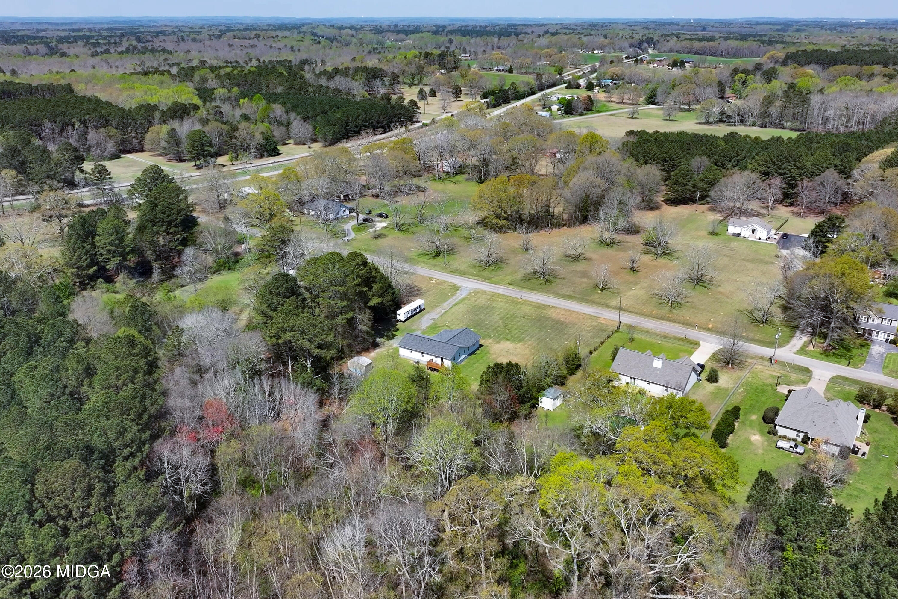 123 Mathews Road Milner, GA 30257 - Photo 47 of 51 an aerial view of a houses with a yard