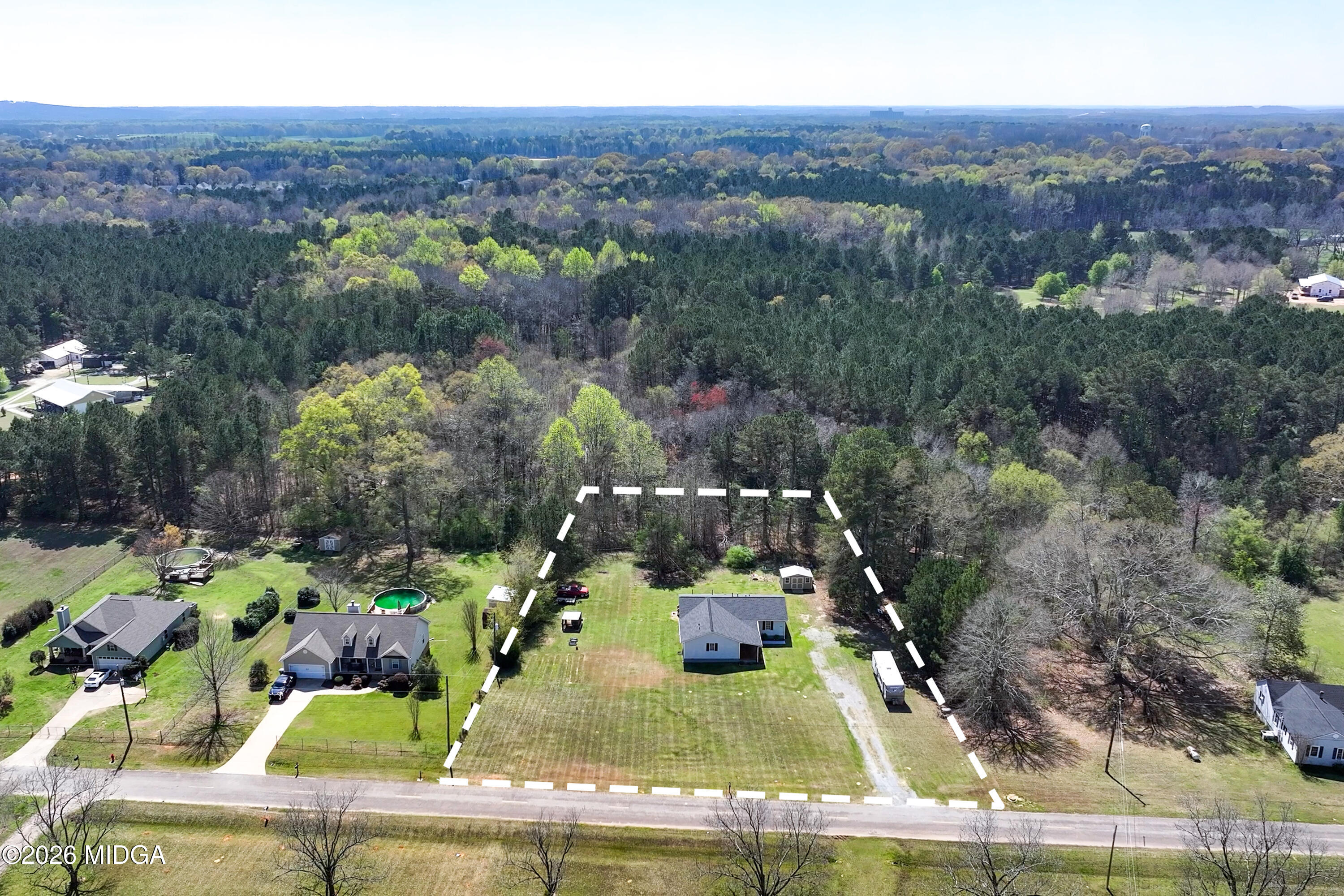 123 Mathews Road Milner, GA 30257 - Photo 51 of 51 an aerial view of house with yard