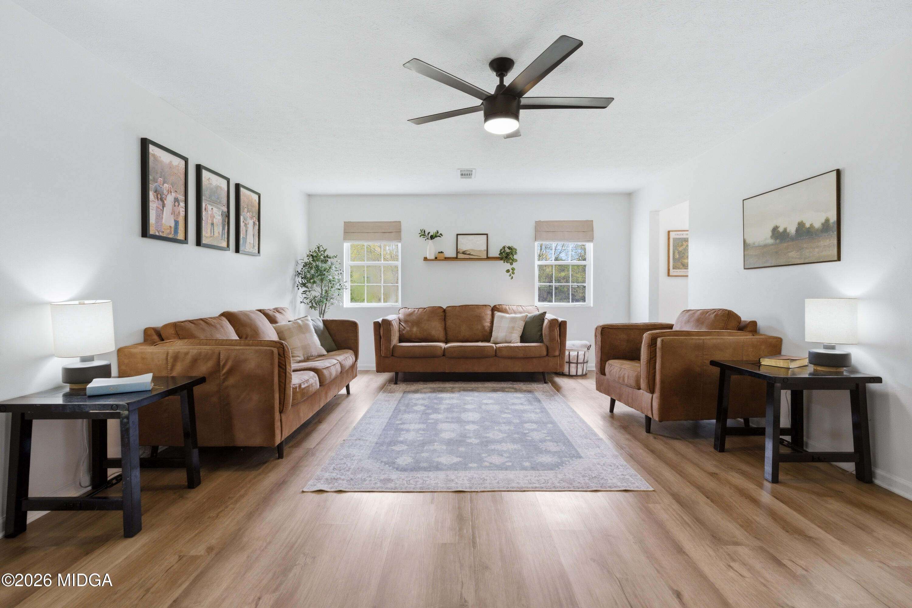 123 Mathews Road Milner, GA 30257 - Photo 7 of 51 a living room with furniture