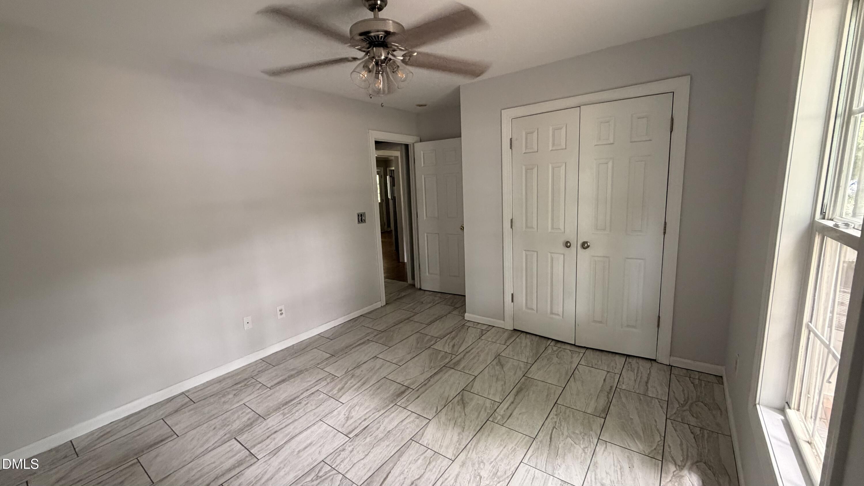 229 Sterling Way Angier, NC 27501 - Photo 2 of 10 a view of entryway with wooden floor
