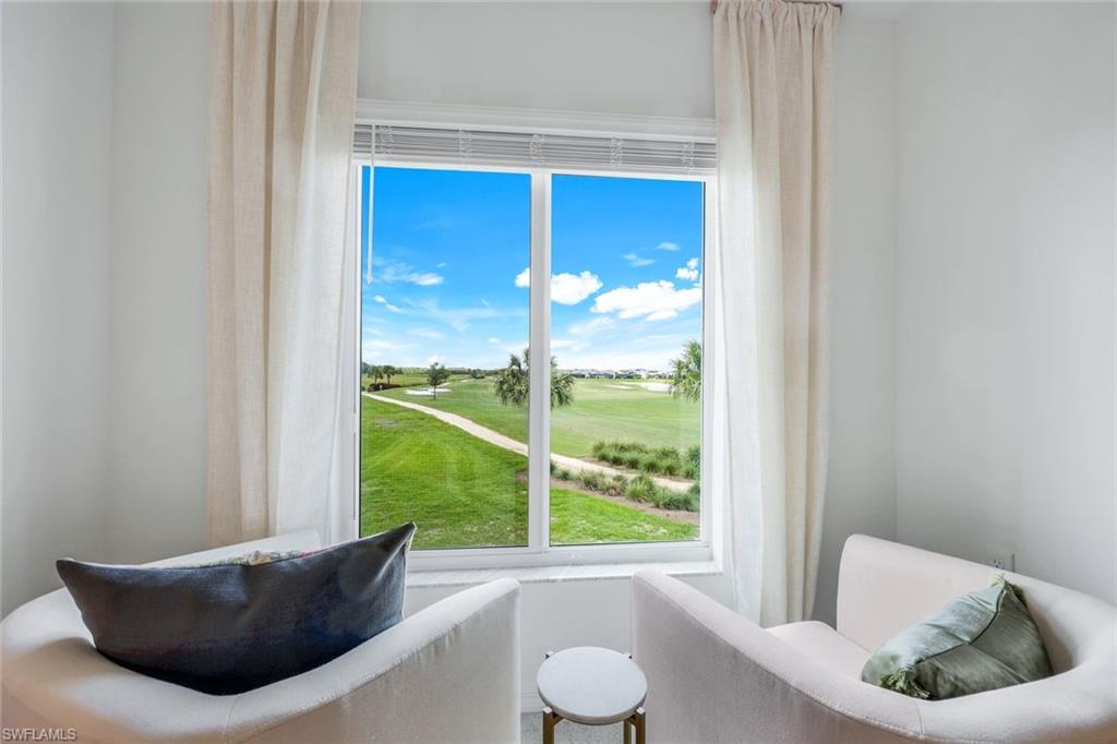 5454 Double Eagle Circle, Unit 3321 Immokalee, FL 34142 - Photo 15 of 40 a living room with furniture and a window