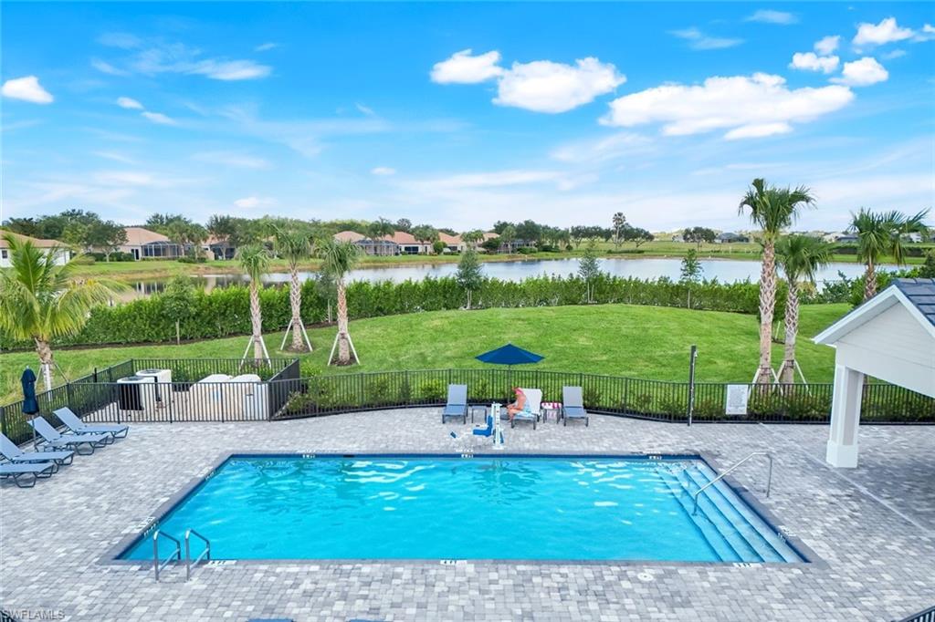 5454 Double Eagle Circle, Unit 3321 Immokalee, FL 34142 - Photo 29 of 40 a view of a garden with patio