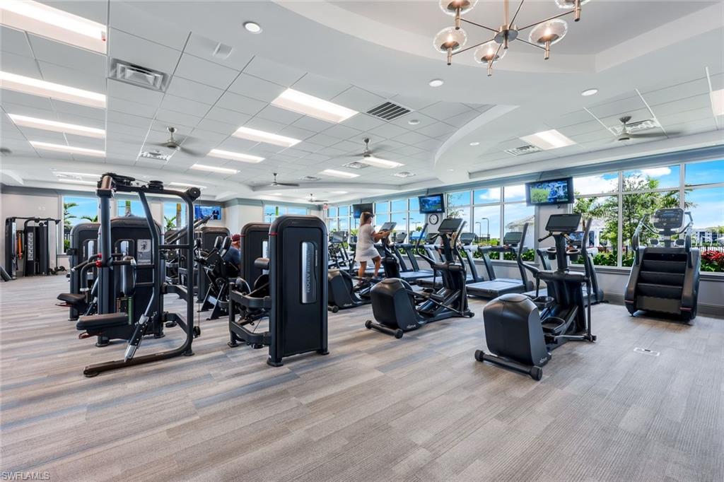 5454 Double Eagle Circle, Unit 3321 Immokalee, FL 34142 - Photo 33 of 40 a view of a room with gym equipment