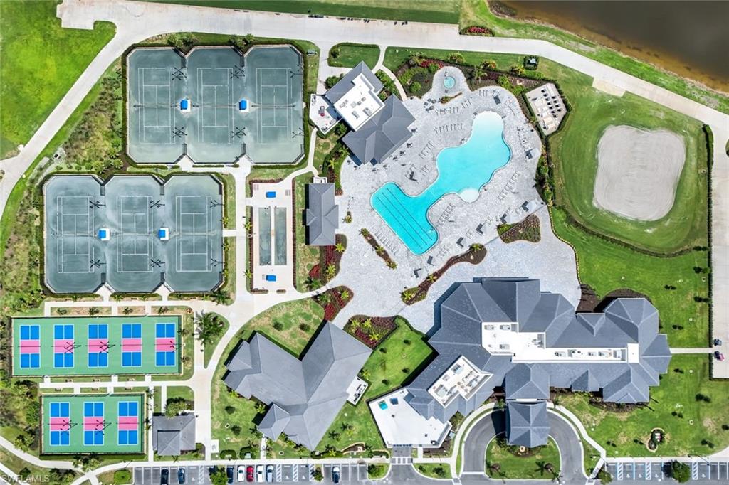 5454 Double Eagle Circle, Unit 3321 Immokalee, FL 34142 - Photo 38 of 40 a picture of a table and chairs in the patio