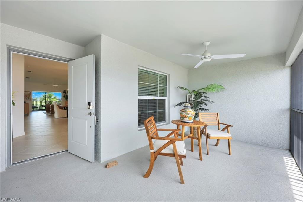 5454 Double Eagle Circle, Unit 3321 Immokalee, FL 34142 - Photo 4 of 40 a dining room with furniture and wooden floor