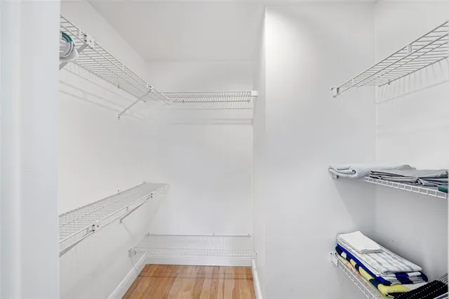 a view of a room with racks on the wall